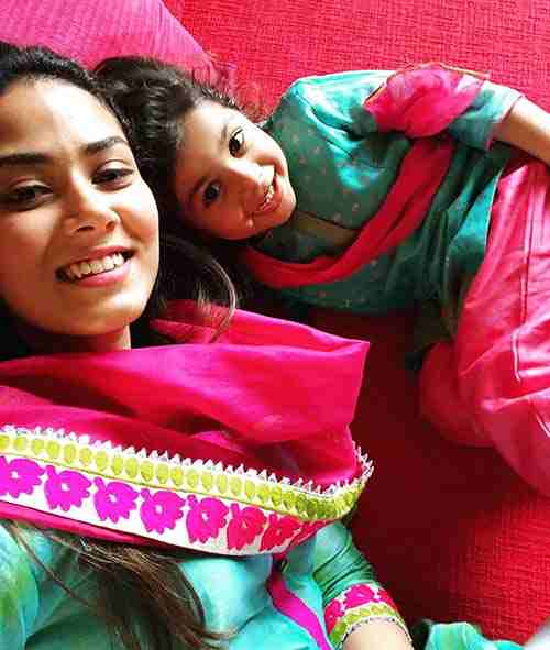 Mira shared this throwback pic with her daughter where both can be seen twinning in green and pink salwar kameez. She captioned the pic as matched.